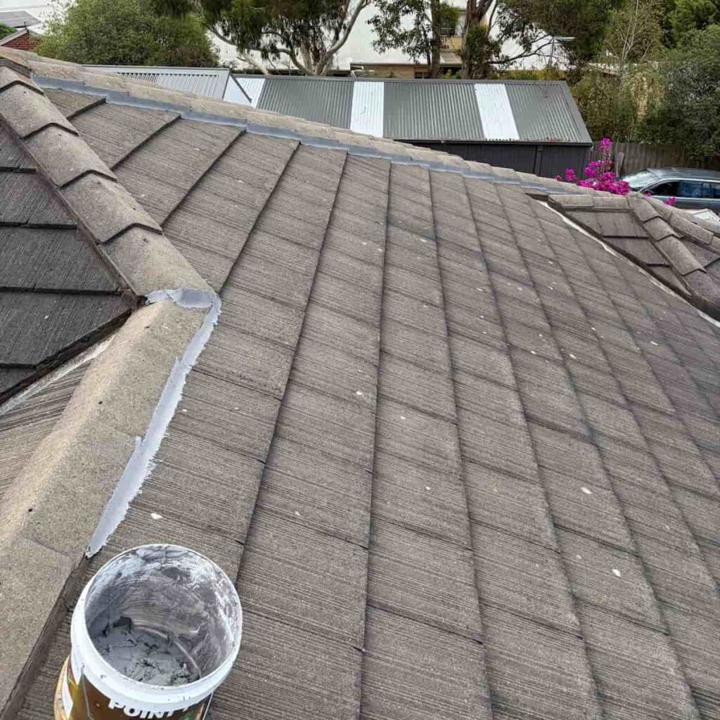 Ridge cap rebedding work example 2 by Barnes Family Roof Plumbing